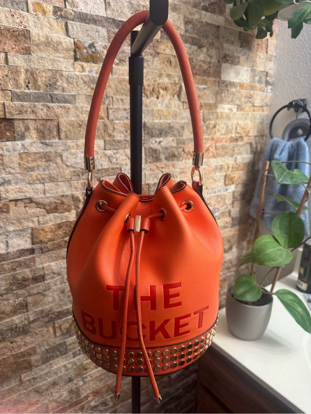 Orange 'The Bucket' Studded Bucket Bag